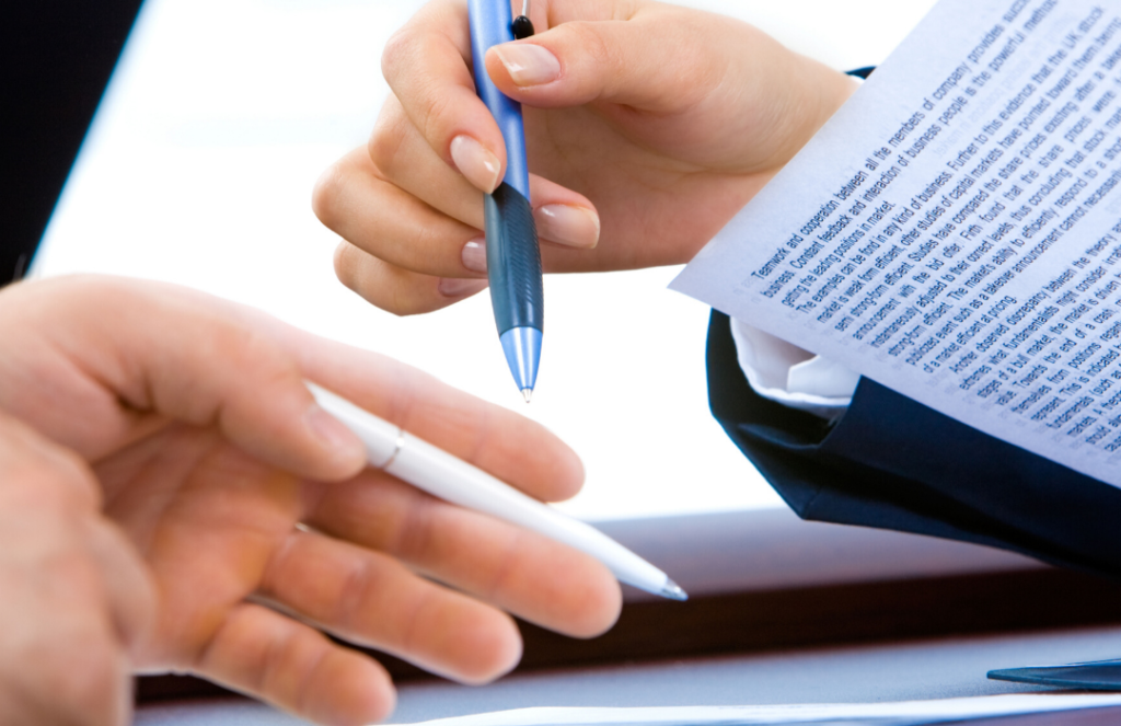 People having discussion about paperwork