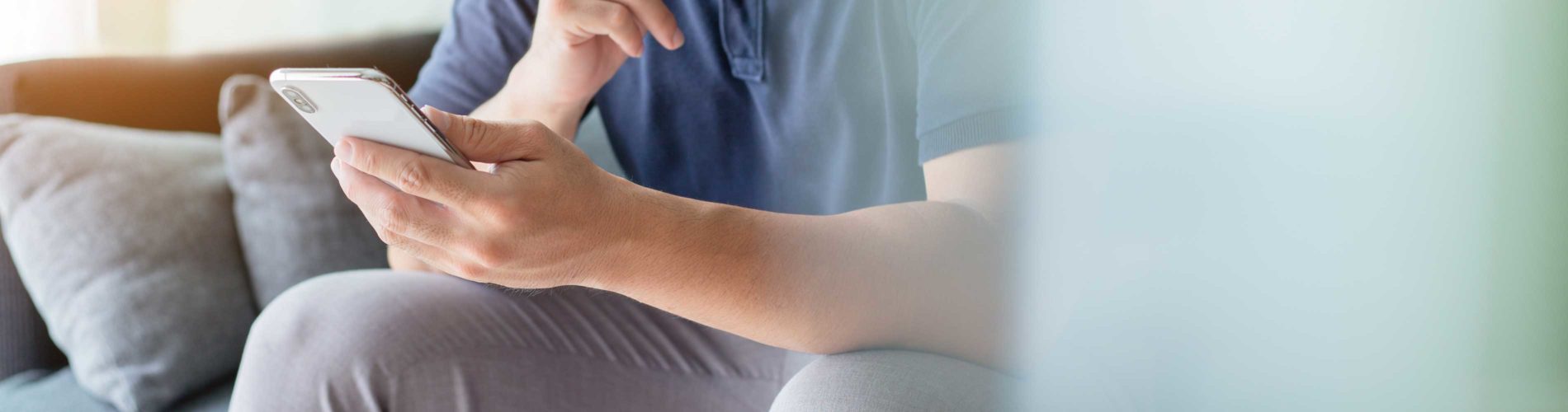person looking at smartphone